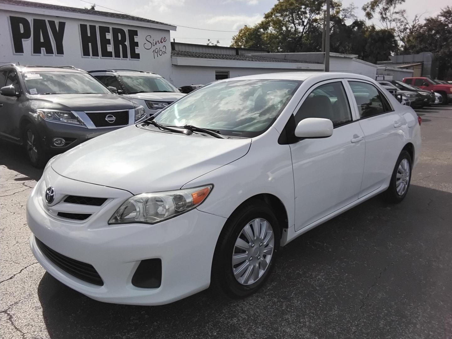 2013 White /Beige Toyota Corolla LE 4-Speed AT (5YFBU4EE0DP) with an 1.8L L4 DOHC 16V engine, 4-Speed Automatic transmission, located at 6112 N Florida Avenue, Tampa, FL, 33604, (888) 521-5131, 27.954929, -82.459534 - $499 DOWN PLUS TAX & TAG. - Photo#2