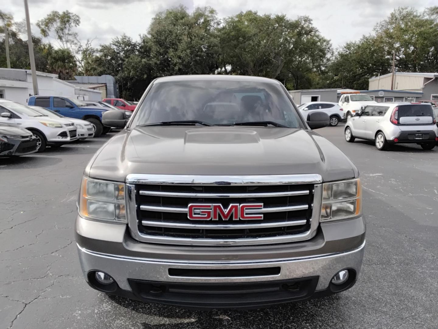 2013 GOLD /Beige GMC Sierra 1500 Work Truck 2WD (1GTN1TEX9DZ) with an 4.3L V6 OHV 12V engine, 6-Speed Automatic transmission, located at 6112 N Florida Avenue, Tampa, FL, 33604, (888) 521-5131, 27.954929, -82.459534 - $499 DOWN PLUS TAX & TAG. - Photo#1