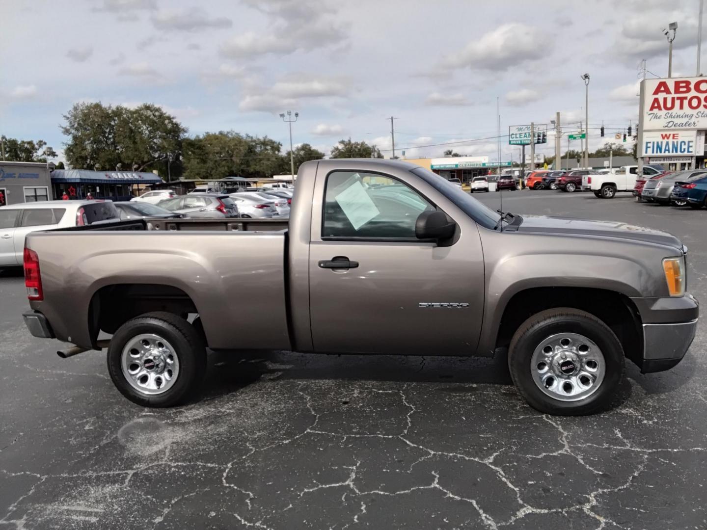 2013 GOLD /Beige GMC Sierra 1500 Work Truck 2WD (1GTN1TEX9DZ) with an 4.3L V6 OHV 12V engine, 6-Speed Automatic transmission, located at 6112 N Florida Avenue, Tampa, FL, 33604, (888) 521-5131, 27.954929, -82.459534 - $499 DOWN PLUS TAX & TAG. - Photo#6