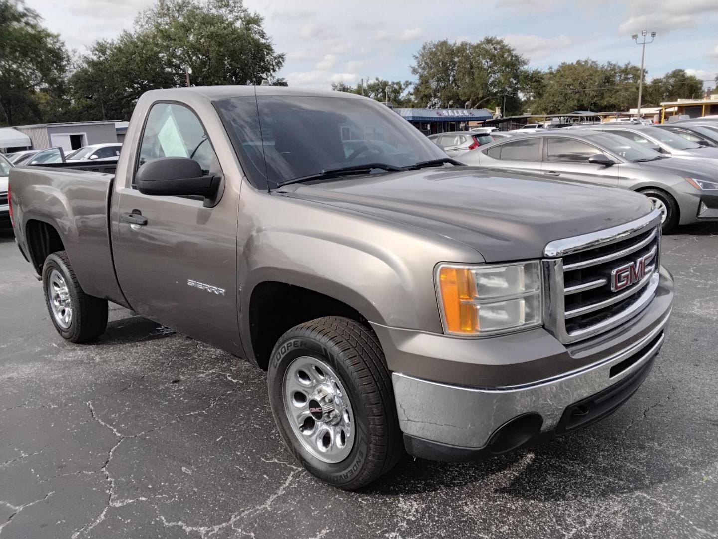2013 GOLD /Beige GMC Sierra 1500 Work Truck 2WD (1GTN1TEX9DZ) with an 4.3L V6 OHV 12V engine, 6-Speed Automatic transmission, located at 6112 N Florida Avenue, Tampa, FL, 33604, (888) 521-5131, 27.954929, -82.459534 - $499 DOWN PLUS TAX & TAG. - Photo#2