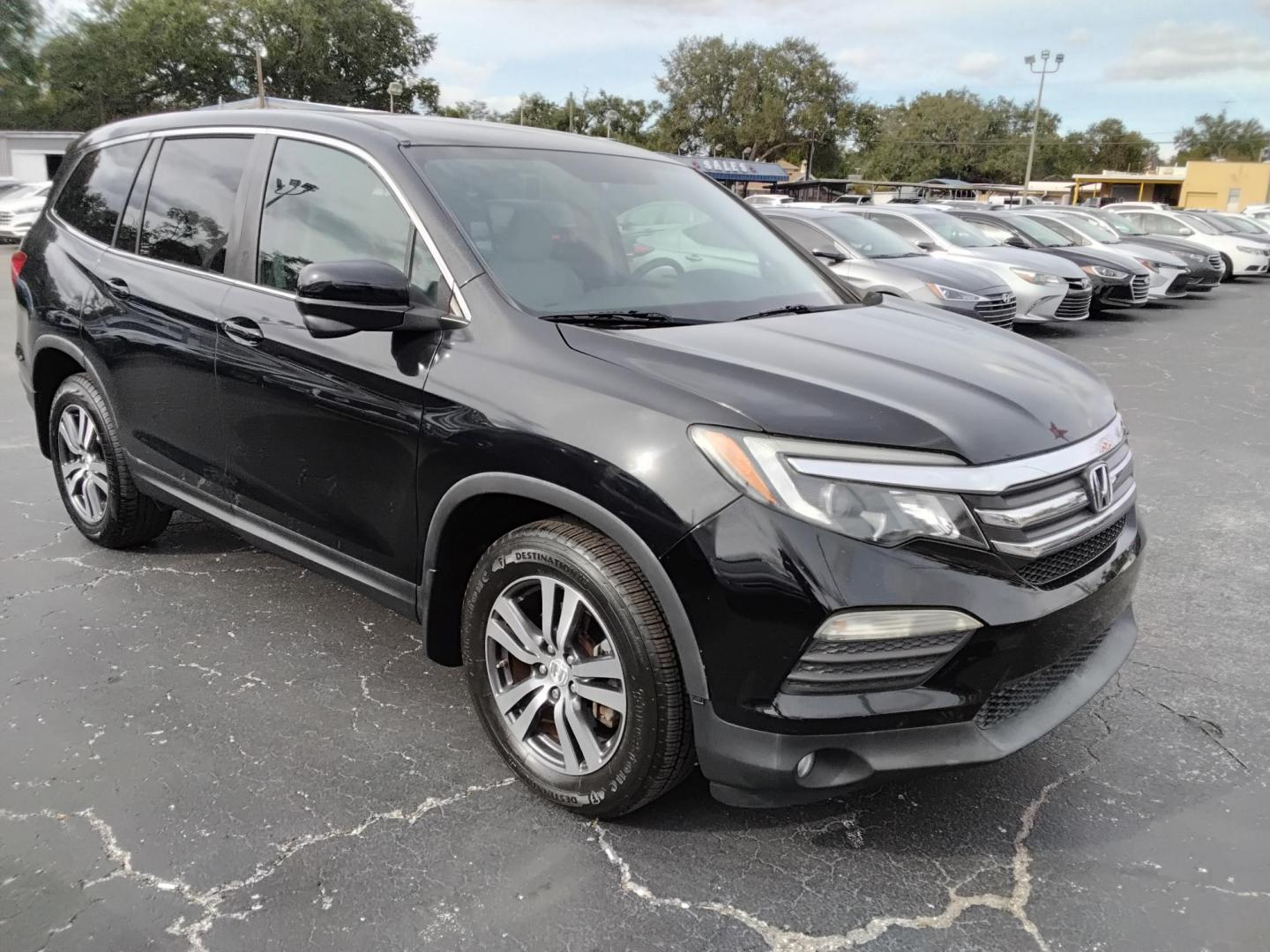 2016 BLACK /Grey Honda Pilot EX 2WD (5FNYF5H31GB) with an 3.5L V6 SOHC 24V engine, 6-Speed Automatic transmission, located at 6112 N Florida Avenue, Tampa, FL, 33604, (888) 521-5131, 27.954929, -82.459534 - $499 down plus tax & tag. - Photo#3