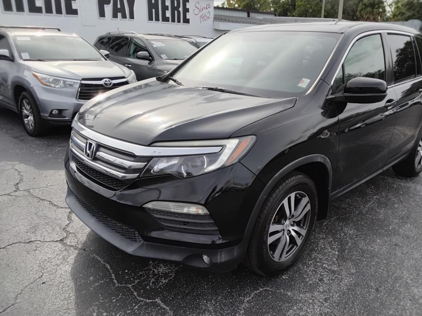 2016 BLACK /Grey Honda Pilot EX 2WD (5FNYF5H31GB) with an 3.5L V6 SOHC 24V engine, 6-Speed Automatic transmission, located at 6112 N Florida Avenue, Tampa, FL, 33604, (888) 521-5131, 27.954929, -82.459534 - $499 down plus tax & tag. - Photo#2