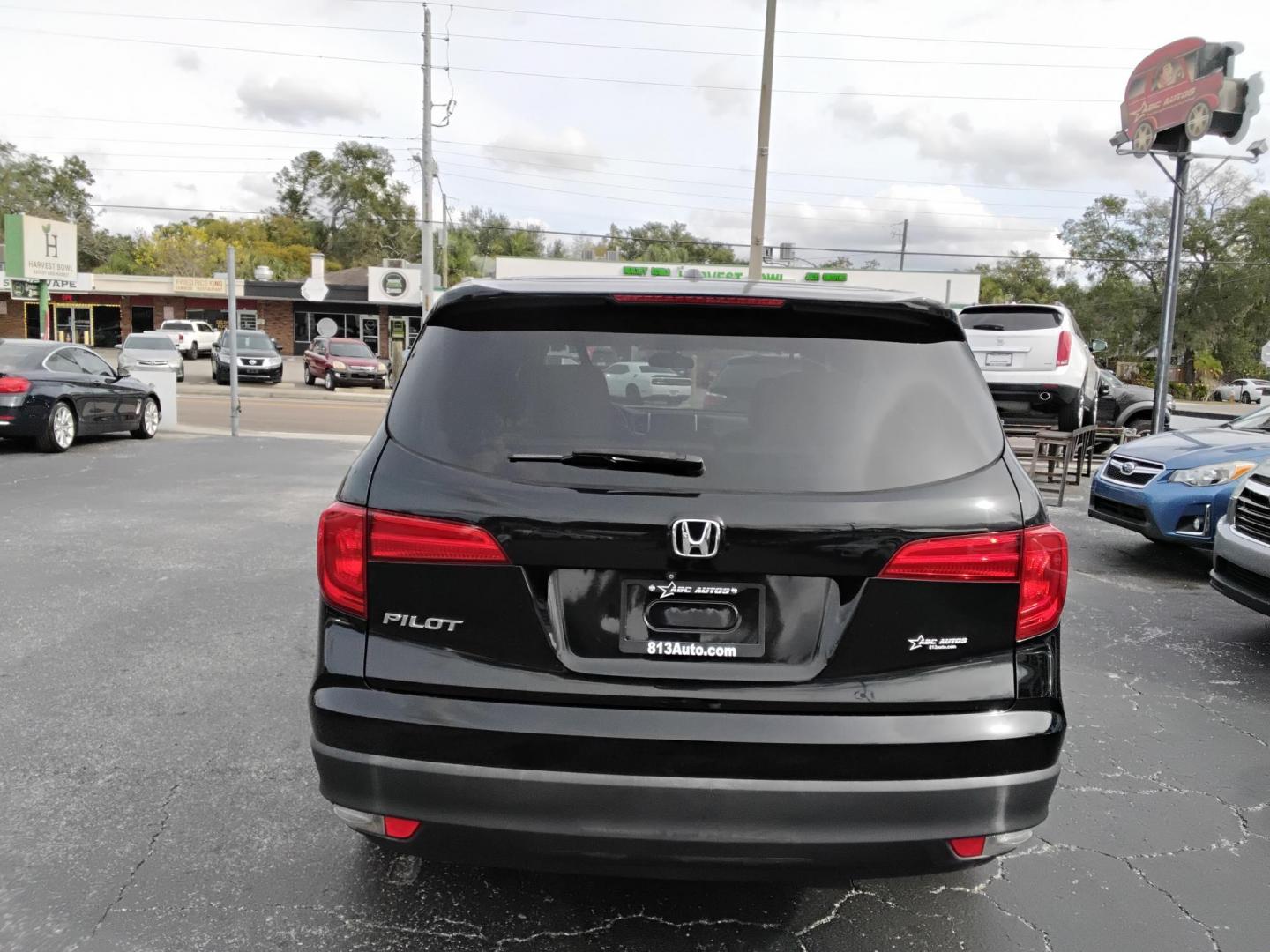 2016 BLACK /Grey Honda Pilot EX 2WD (5FNYF5H31GB) with an 3.5L V6 SOHC 24V engine, 6-Speed Automatic transmission, located at 6112 N Florida Avenue, Tampa, FL, 33604, (888) 521-5131, 27.954929, -82.459534 - $499 down plus tax & tag. - Photo#6