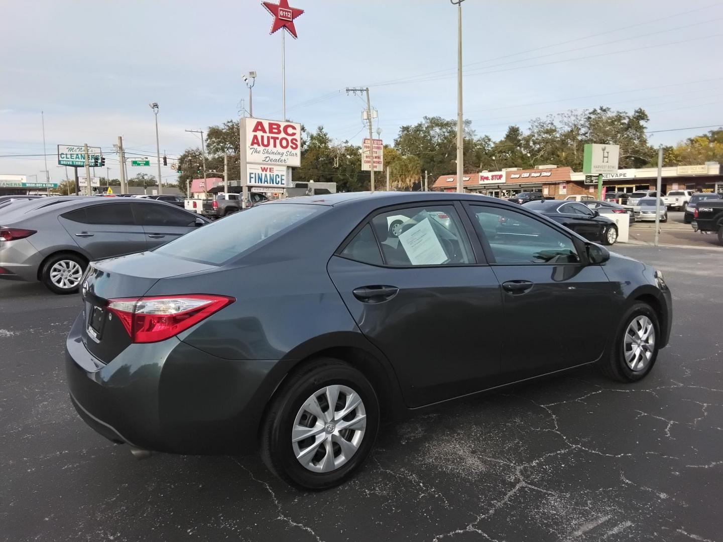 2016 GRAY /Grey Toyota Corolla L 4-Speed AT (2T1BURHE7GC) with an 1.8L L4 DOHC 16V engine, 4A transmission, located at 6112 N Florida Avenue, Tampa, FL, 33604, (888) 521-5131, 27.954929, -82.459534 - $499 DOWN PLUS TAX & TAG. - Photo#2