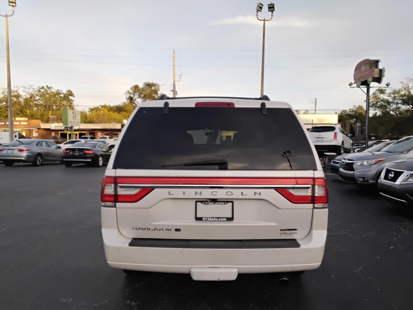2016 White /Black Lincoln Navigator L Reserve 4WD (5LMJJ3LT0GE) with an 3.5L V6 DOHC 24V FFV engine, 6A transmission, located at 6112 N Florida Avenue, Tampa, FL, 33604, (888) 521-5131, 27.954929, -82.459534 - $499 DOWN PLUS TAX & TAG. - Photo#7