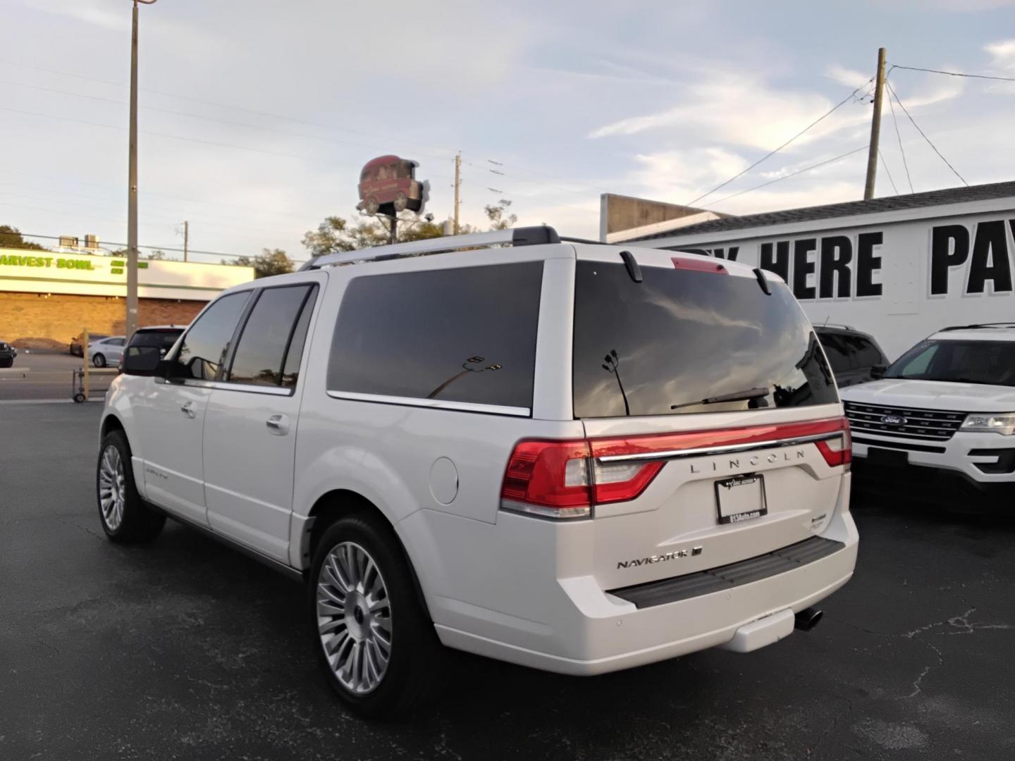 2016 White /Black Lincoln Navigator L Reserve 4WD (5LMJJ3LT0GE) with an 3.5L V6 DOHC 24V FFV engine, 6A transmission, located at 6112 N Florida Avenue, Tampa, FL, 33604, (888) 521-5131, 27.954929, -82.459534 - $499 DOWN PLUS TAX & TAG. - Photo#6