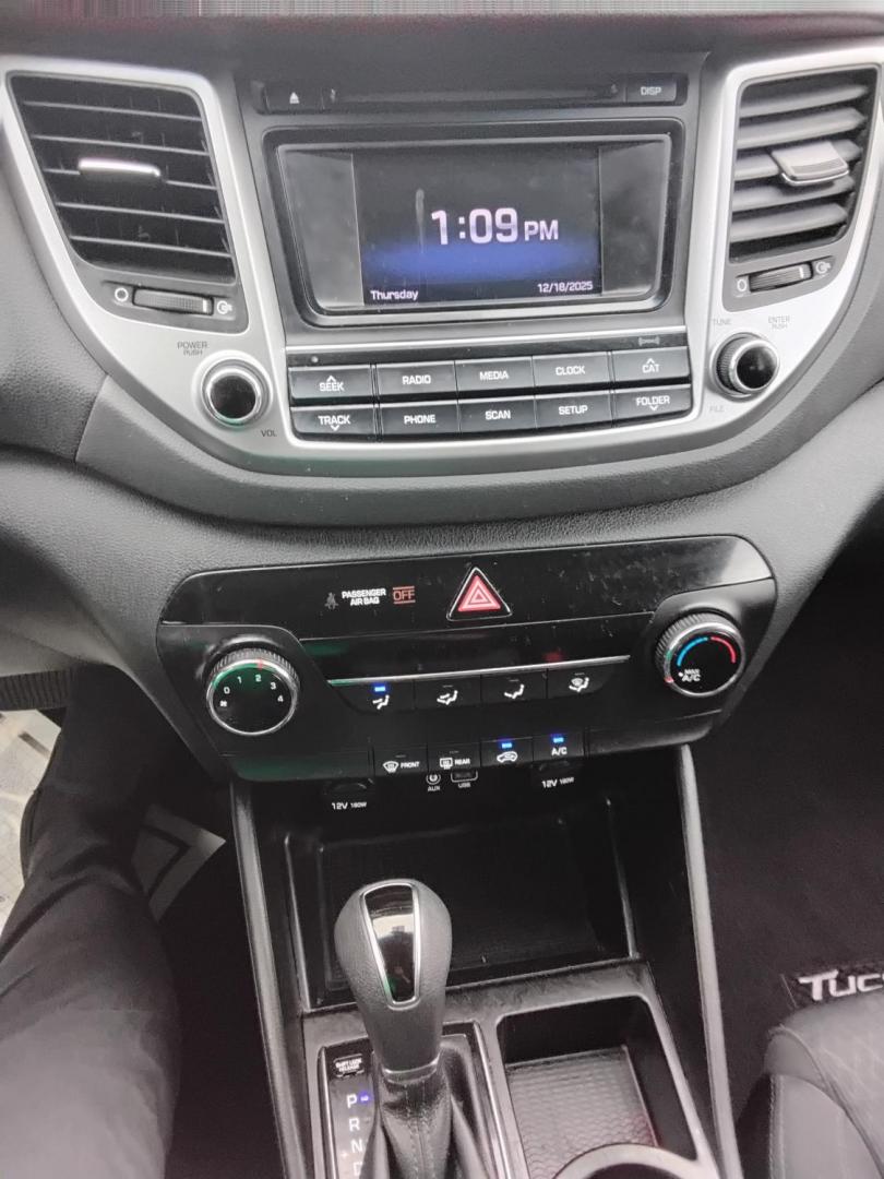 2017 BLUE /Grey Hyundai Tucson SE (KM8J23A45HU) with an 2.0L L4 DOHC 16V engine, 6A transmission, located at 6112 N Florida Avenue, Tampa, FL, 33604, (888) 521-5131, 27.954929, -82.459534 - $499 DOWN PLUS TAX & TAG. - Photo#16
