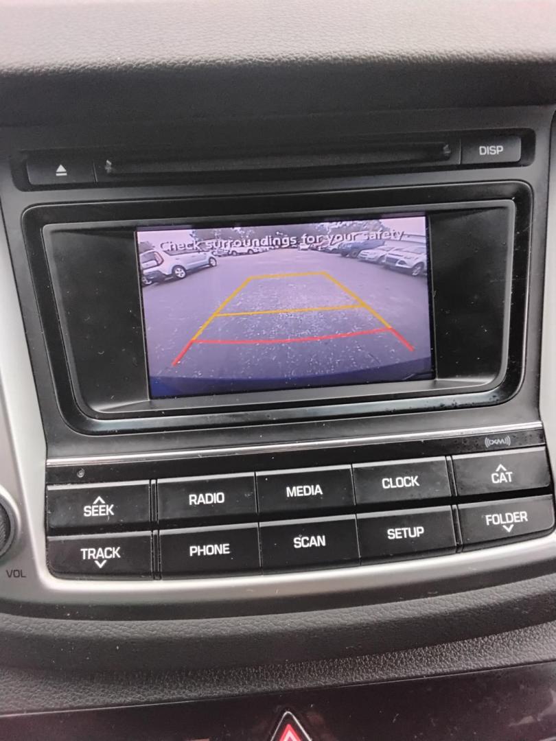 2017 BLUE /Grey Hyundai Tucson SE (KM8J23A45HU) with an 2.0L L4 DOHC 16V engine, 6A transmission, located at 6112 N Florida Avenue, Tampa, FL, 33604, (888) 521-5131, 27.954929, -82.459534 - $499 DOWN PLUS TAX & TAG. - Photo#20