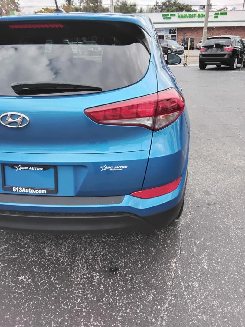 2017 BLUE /Grey Hyundai Tucson SE (KM8J23A45HU) with an 2.0L L4 DOHC 16V engine, 6A transmission, located at 6112 N Florida Avenue, Tampa, FL, 33604, (888) 521-5131, 27.954929, -82.459534 - $499 DOWN PLUS TAX & TAG. - Photo#7