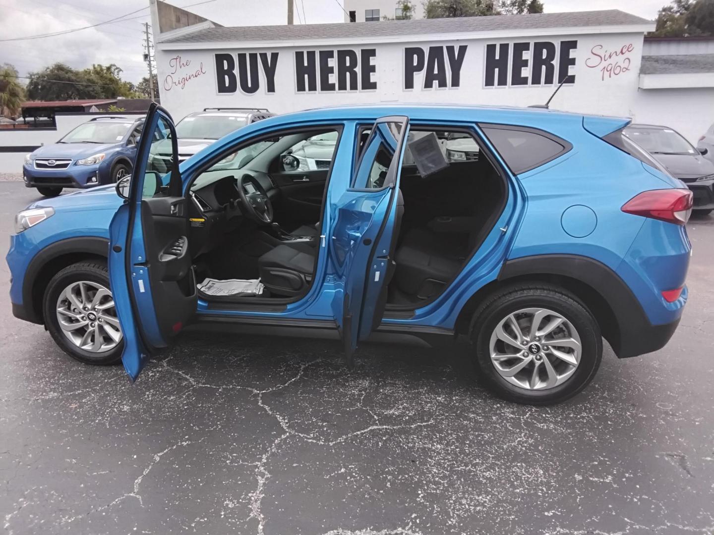 2017 BLUE /Grey Hyundai Tucson SE (KM8J23A45HU) with an 2.0L L4 DOHC 16V engine, 6A transmission, located at 6112 N Florida Avenue, Tampa, FL, 33604, (888) 521-5131, 27.954929, -82.459534 - $499 DOWN PLUS TAX & TAG. - Photo#1