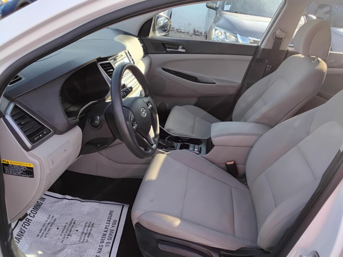 2016 White /White Hyundai Tucson SE (KM8J23A40GU) with an 2.0L L4 DOHC 16V engine, 6A transmission, located at 6112 N Florida Avenue, Tampa, FL, 33604, (888) 521-5131, 27.954929, -82.459534 - $499 DOWN PLUS TAX & TAG. - Photo#9