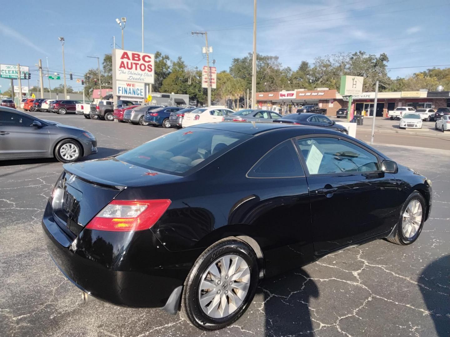 2010 BLACK /Grey Honda Civic EX Coupe 5-Speed AT (2HGFG1B89AH) with an 1.8L L4 SOHC 16V engine, 5-Speed Automatic transmission, located at 6112 N Florida Avenue, Tampa, FL, 33604, (888) 521-5131, 27.954929, -82.459534 - $499 DOWN PLUS TAX & TAG. - Photo#4