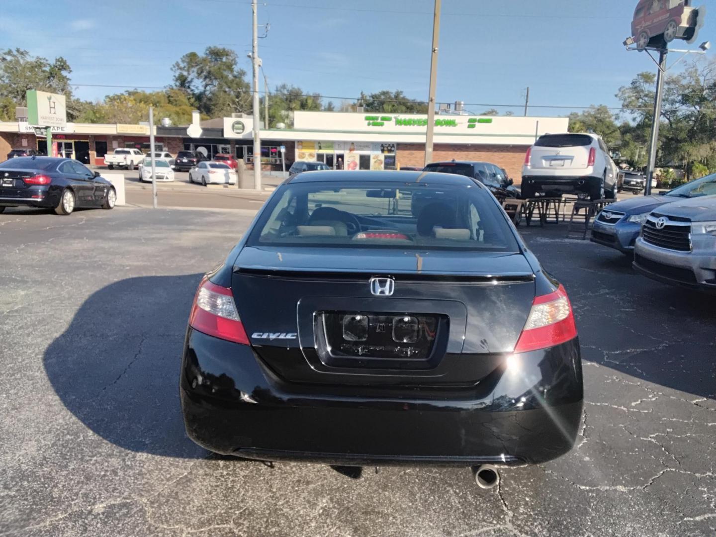 2010 BLACK /Grey Honda Civic EX Coupe 5-Speed AT (2HGFG1B89AH) with an 1.8L L4 SOHC 16V engine, 5-Speed Automatic transmission, located at 6112 N Florida Avenue, Tampa, FL, 33604, (888) 521-5131, 27.954929, -82.459534 - $499 DOWN PLUS TAX & TAG. - Photo#7