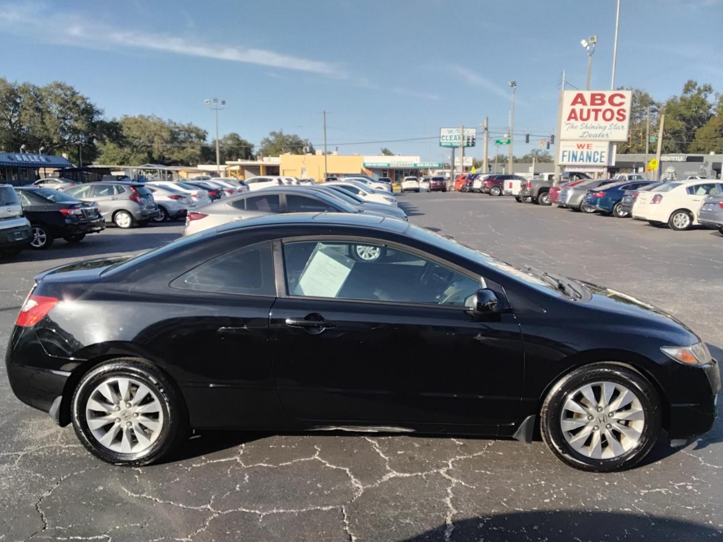 2010 BLACK /Grey Honda Civic EX Coupe 5-Speed AT (2HGFG1B89AH) with an 1.8L L4 SOHC 16V engine, 5-Speed Automatic transmission, located at 6112 N Florida Avenue, Tampa, FL, 33604, (888) 521-5131, 27.954929, -82.459534 - $499 DOWN PLUS TAX & TAG. - Photo#5