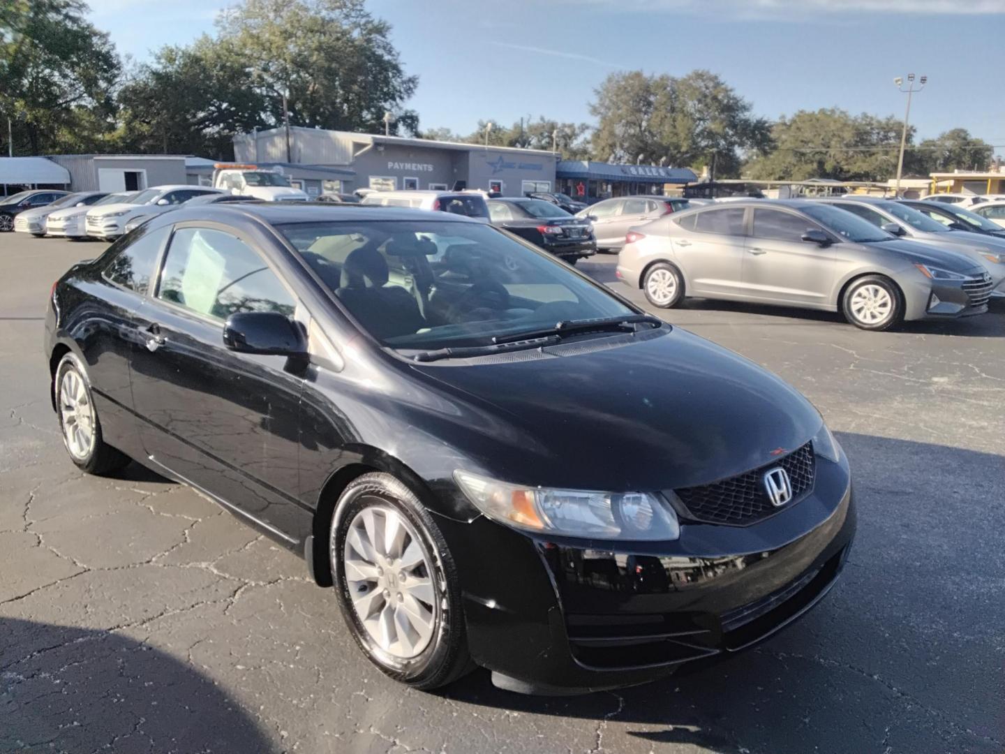 2010 BLACK /Grey Honda Civic EX Coupe 5-Speed AT (2HGFG1B89AH) with an 1.8L L4 SOHC 16V engine, 5-Speed Automatic transmission, located at 6112 N Florida Avenue, Tampa, FL, 33604, (888) 521-5131, 27.954929, -82.459534 - $499 DOWN PLUS TAX & TAG. - Photo#3