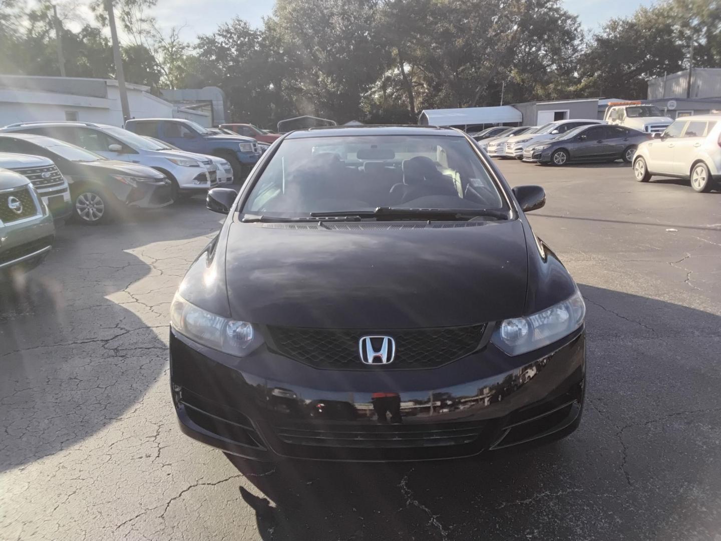 2010 BLACK /Grey Honda Civic EX Coupe 5-Speed AT (2HGFG1B89AH) with an 1.8L L4 SOHC 16V engine, 5-Speed Automatic transmission, located at 6112 N Florida Avenue, Tampa, FL, 33604, (888) 521-5131, 27.954929, -82.459534 - $499 DOWN PLUS TAX & TAG. - Photo#2
