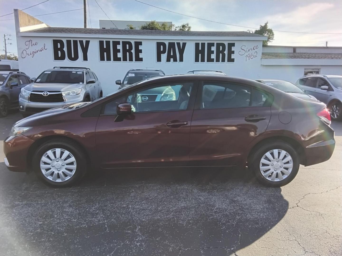 2015 RED /Beige Honda Civic LX Sedan CVT (19XFB2F57FE) with an 1.8L L4 SOHC 16V engine, Continuously Variable Transmission transmission, located at 6112 N Florida Avenue, Tampa, FL, 33604, (888) 521-5131, 27.954929, -82.459534 - $499 DOWN PLUS TAX & TAG. - Photo#0