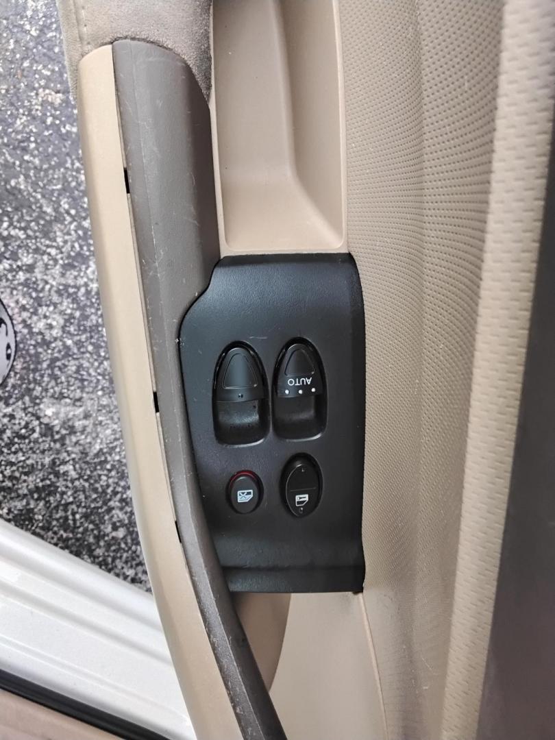 2007 White /Beige Honda Civic LX Coupe AT (2HGFG12697H) with an 1.8L L4 SOHC 16V engine, 5-Speed Automatic Overdrive transmission, located at 6112 N Florida Avenue, Tampa, FL, 33604, (888) 521-5131, 27.954929, -82.459534 - $499 down plus tax & tag. - Photo#17