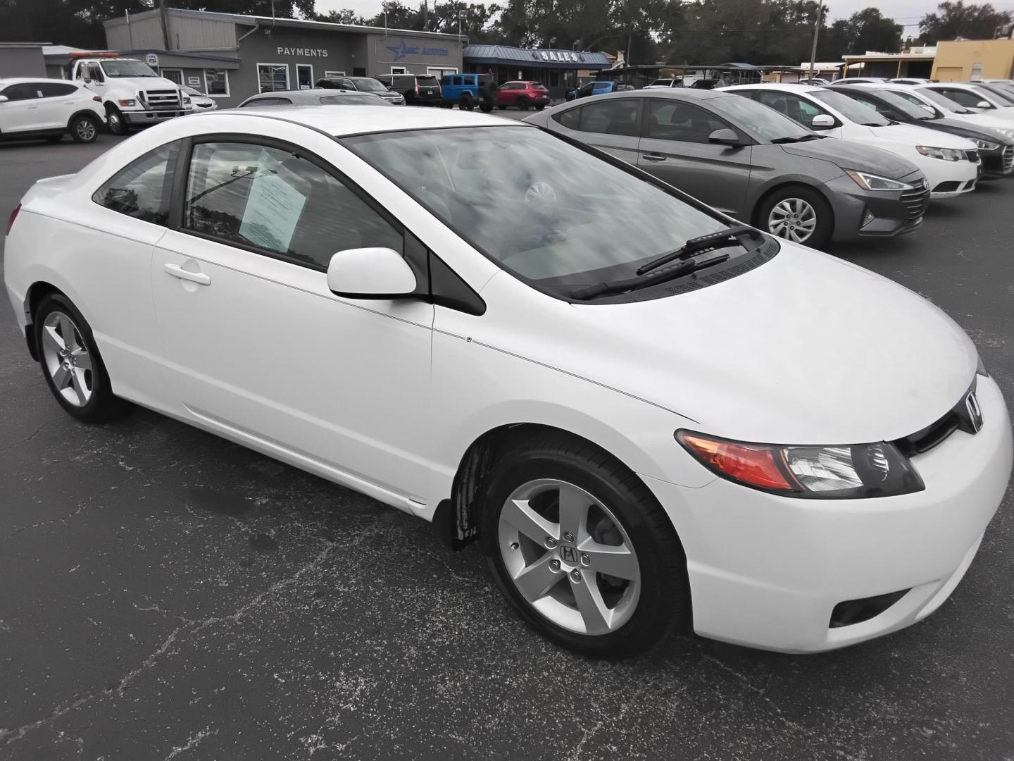 2007 White /Beige Honda Civic LX Coupe AT (2HGFG12697H) with an 1.8L L4 SOHC 16V engine, 5-Speed Automatic Overdrive transmission, located at 6112 N Florida Avenue, Tampa, FL, 33604, (888) 521-5131, 27.954929, -82.459534 - $499 down plus tax & tag. - Photo#6