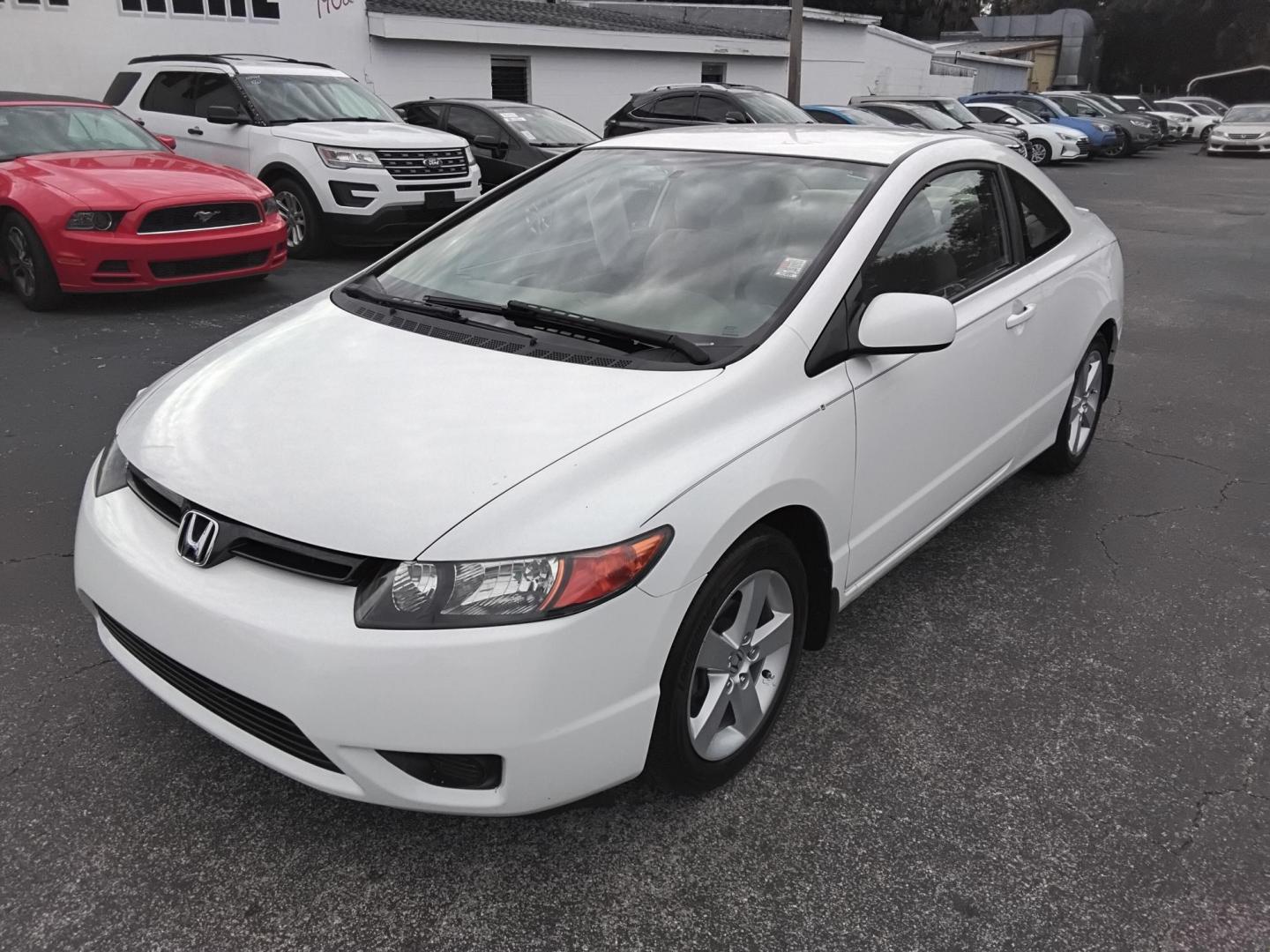 2007 White /Beige Honda Civic LX Coupe AT (2HGFG12697H) with an 1.8L L4 SOHC 16V engine, 5-Speed Automatic Overdrive transmission, located at 6112 N Florida Avenue, Tampa, FL, 33604, (888) 521-5131, 27.954929, -82.459534 - $499 down plus tax & tag. - Photo#1
