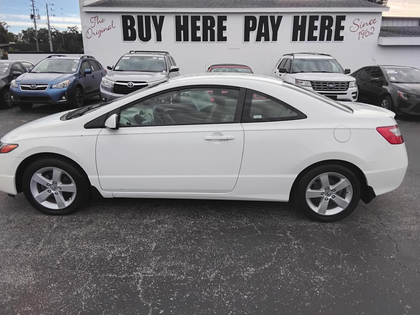 2007 White /Beige Honda Civic LX Coupe AT (2HGFG12697H) with an 1.8L L4 SOHC 16V engine, 5-Speed Automatic Overdrive transmission, located at 6112 N Florida Avenue, Tampa, FL, 33604, (888) 521-5131, 27.954929, -82.459534 - $499 down plus tax & tag. - Photo#0