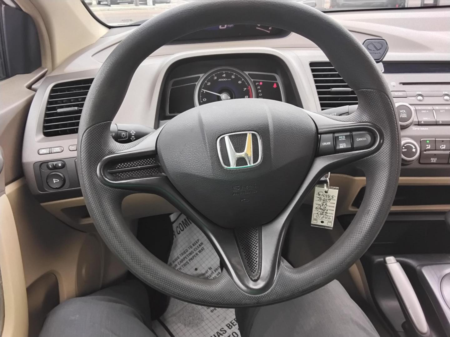 2007 White /Beige Honda Civic LX Coupe AT (2HGFG12697H) with an 1.8L L4 SOHC 16V engine, 5-Speed Automatic Overdrive transmission, located at 6112 N Florida Avenue, Tampa, FL, 33604, (888) 521-5131, 27.954929, -82.459534 - $499 down plus tax & tag. - Photo#11