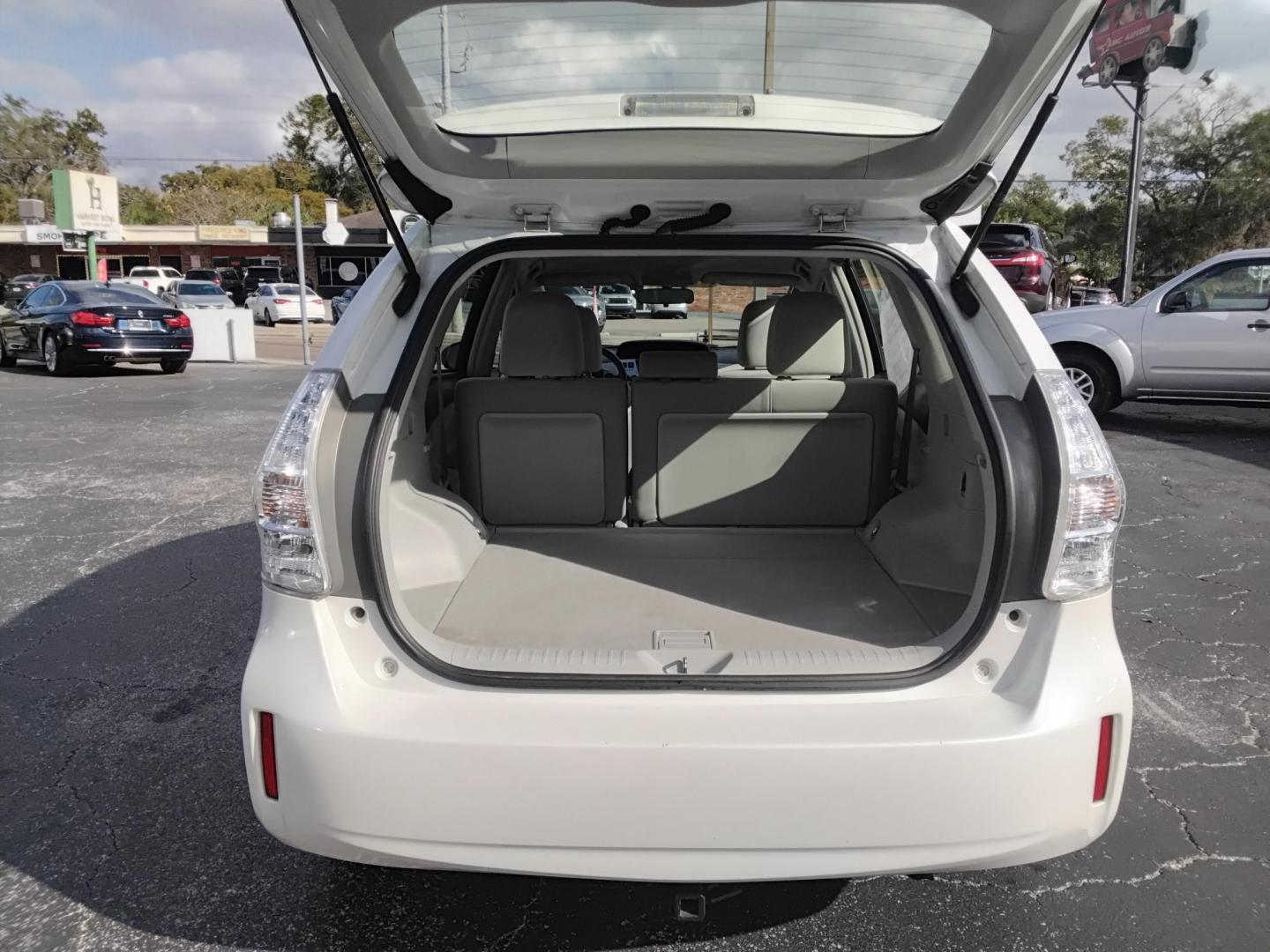 2014 White /White Toyota Prius V Three (JTDZN3EU2E3) with an 1.8L L4 DOHC 16V HYBRID engine, Continuously Variable Transmission transmission, located at 6112 N Florida Avenue, Tampa, FL, 33604, (888) 521-5131, 27.954929, -82.459534 - $499 down plus tax & tag. - Photo#8