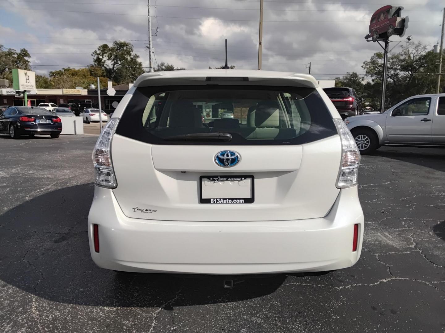 2014 White /White Toyota Prius V Three (JTDZN3EU2E3) with an 1.8L L4 DOHC 16V HYBRID engine, Continuously Variable Transmission transmission, located at 6112 N Florida Avenue, Tampa, FL, 33604, (888) 521-5131, 27.954929, -82.459534 - $499 down plus tax & tag. - Photo#7
