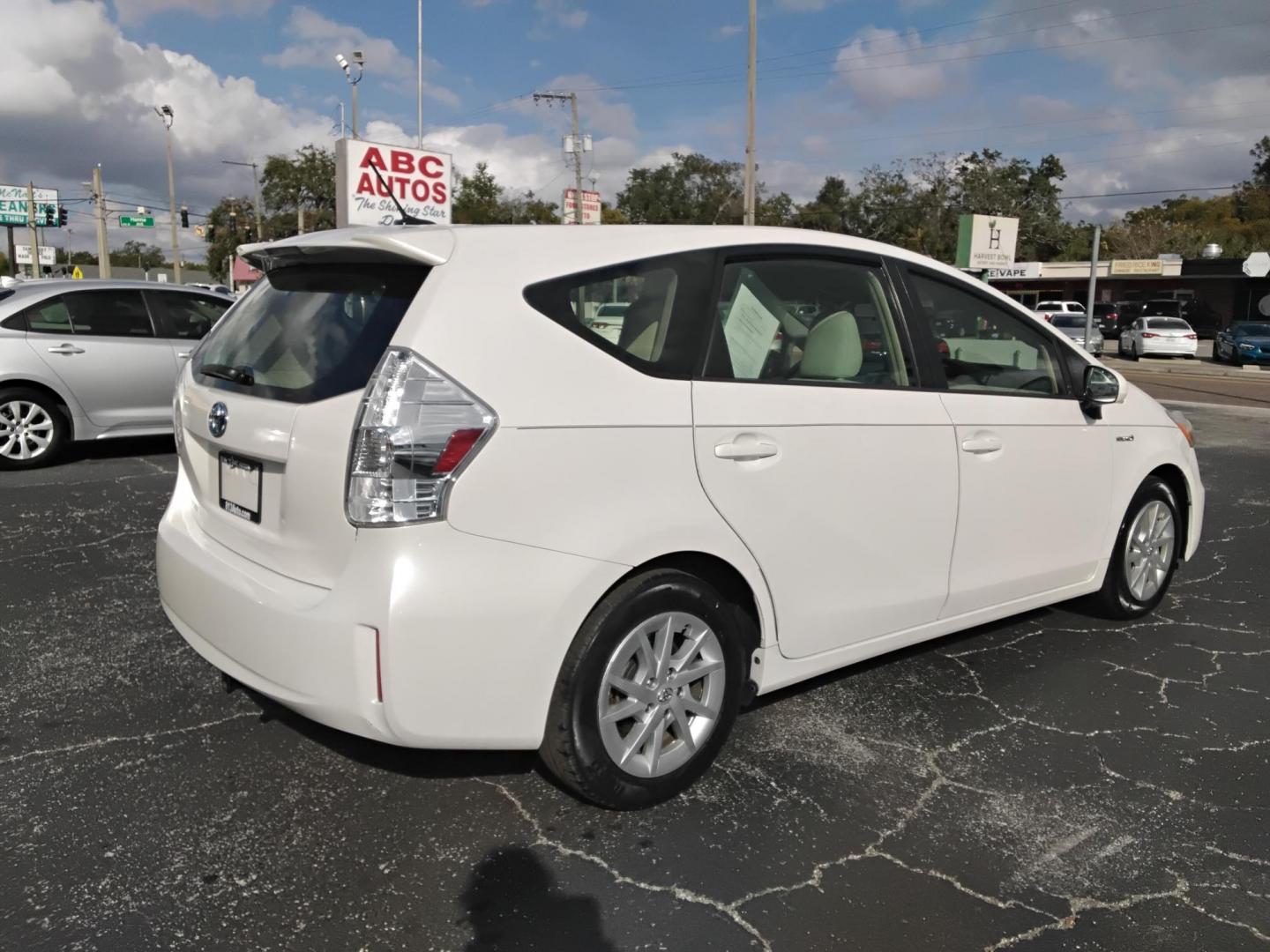 2014 White /White Toyota Prius V Three (JTDZN3EU2E3) with an 1.8L L4 DOHC 16V HYBRID engine, Continuously Variable Transmission transmission, located at 6112 N Florida Avenue, Tampa, FL, 33604, (888) 521-5131, 27.954929, -82.459534 - $499 down plus tax & tag. - Photo#5