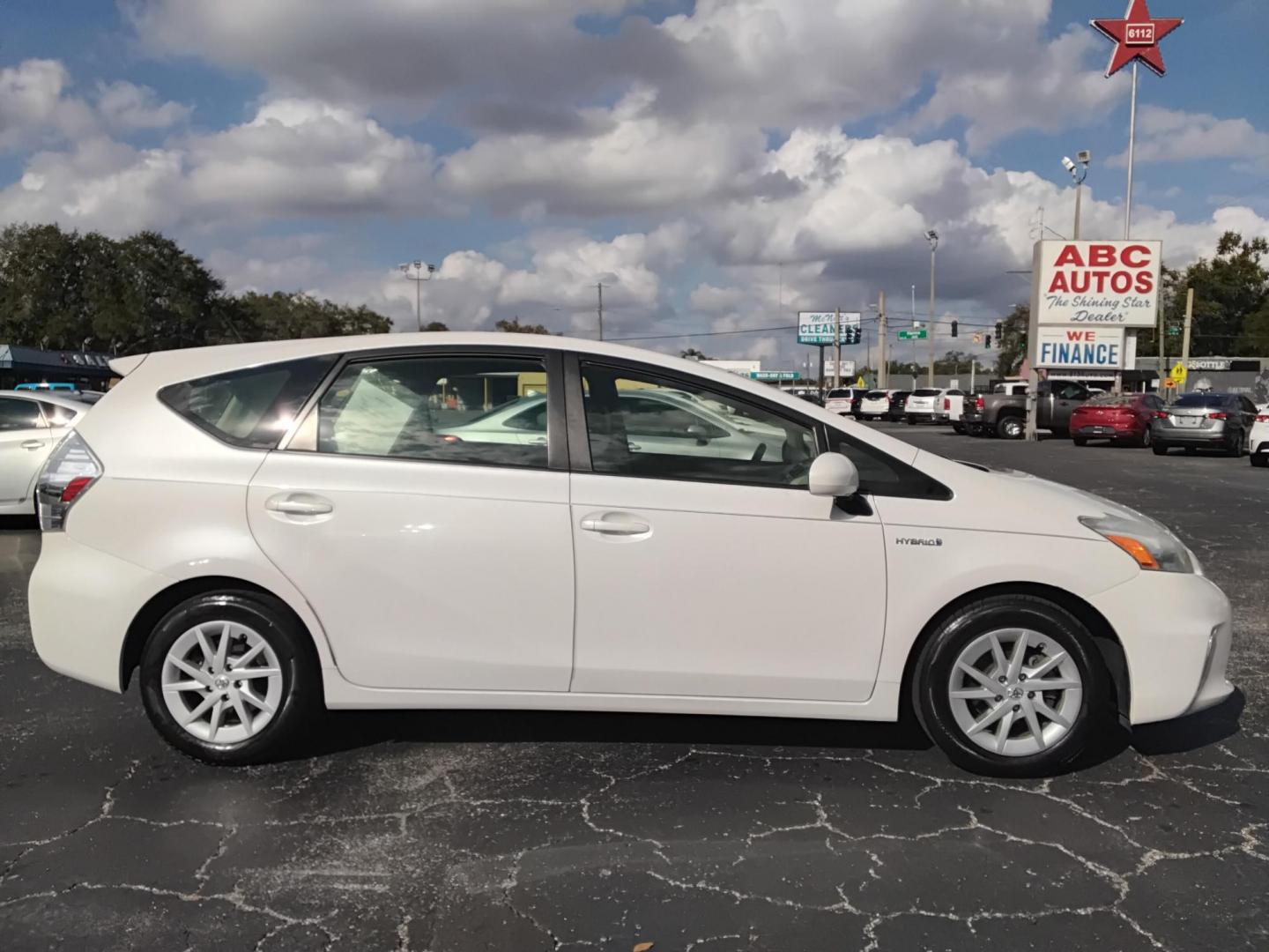 2014 White /White Toyota Prius V Three (JTDZN3EU2E3) with an 1.8L L4 DOHC 16V HYBRID engine, Continuously Variable Transmission transmission, located at 6112 N Florida Avenue, Tampa, FL, 33604, (888) 521-5131, 27.954929, -82.459534 - $499 down plus tax & tag. - Photo#6