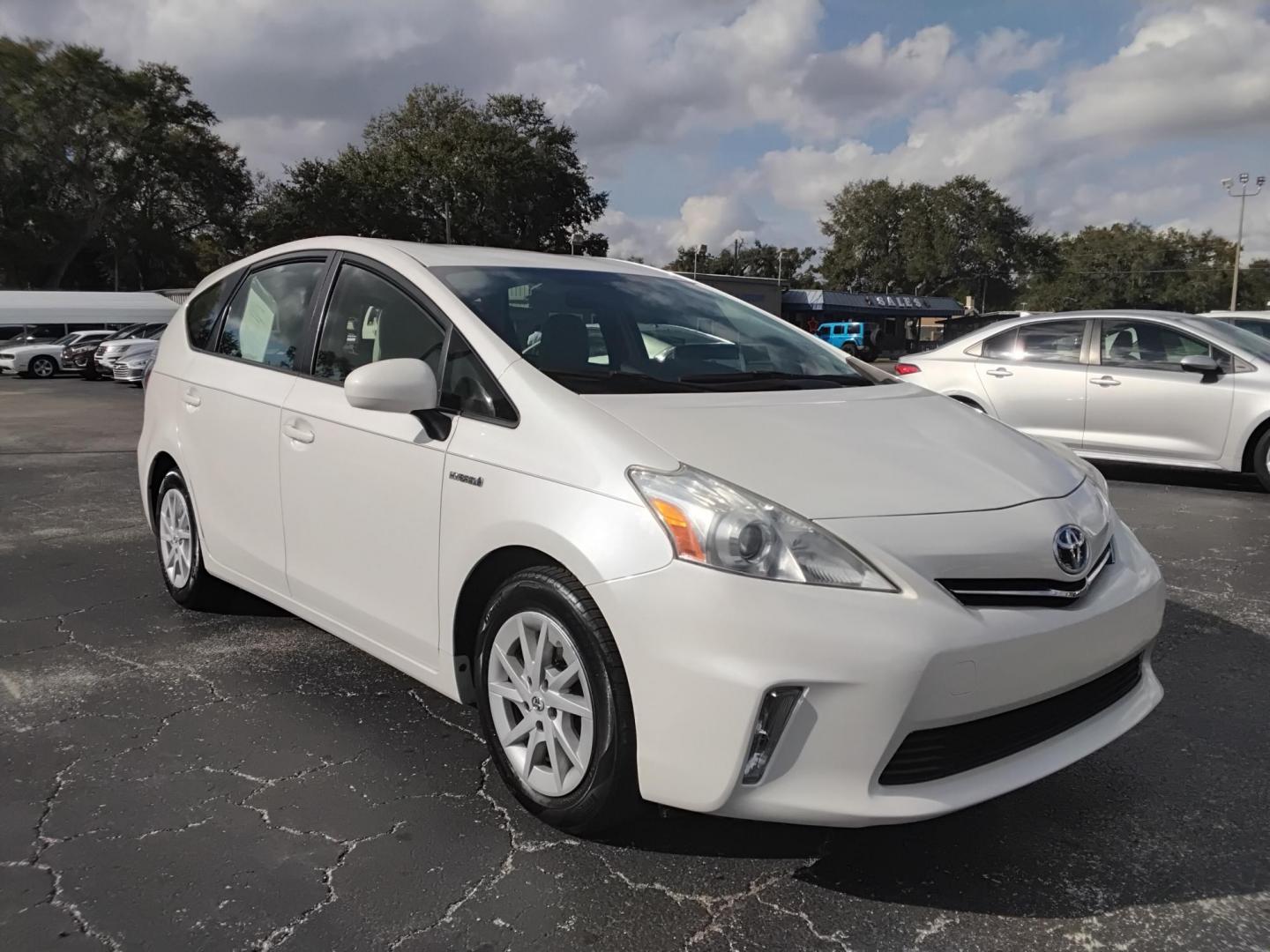 2014 White /White Toyota Prius V Three (JTDZN3EU2E3) with an 1.8L L4 DOHC 16V HYBRID engine, Continuously Variable Transmission transmission, located at 6112 N Florida Avenue, Tampa, FL, 33604, (888) 521-5131, 27.954929, -82.459534 - $499 down plus tax & tag. - Photo#3