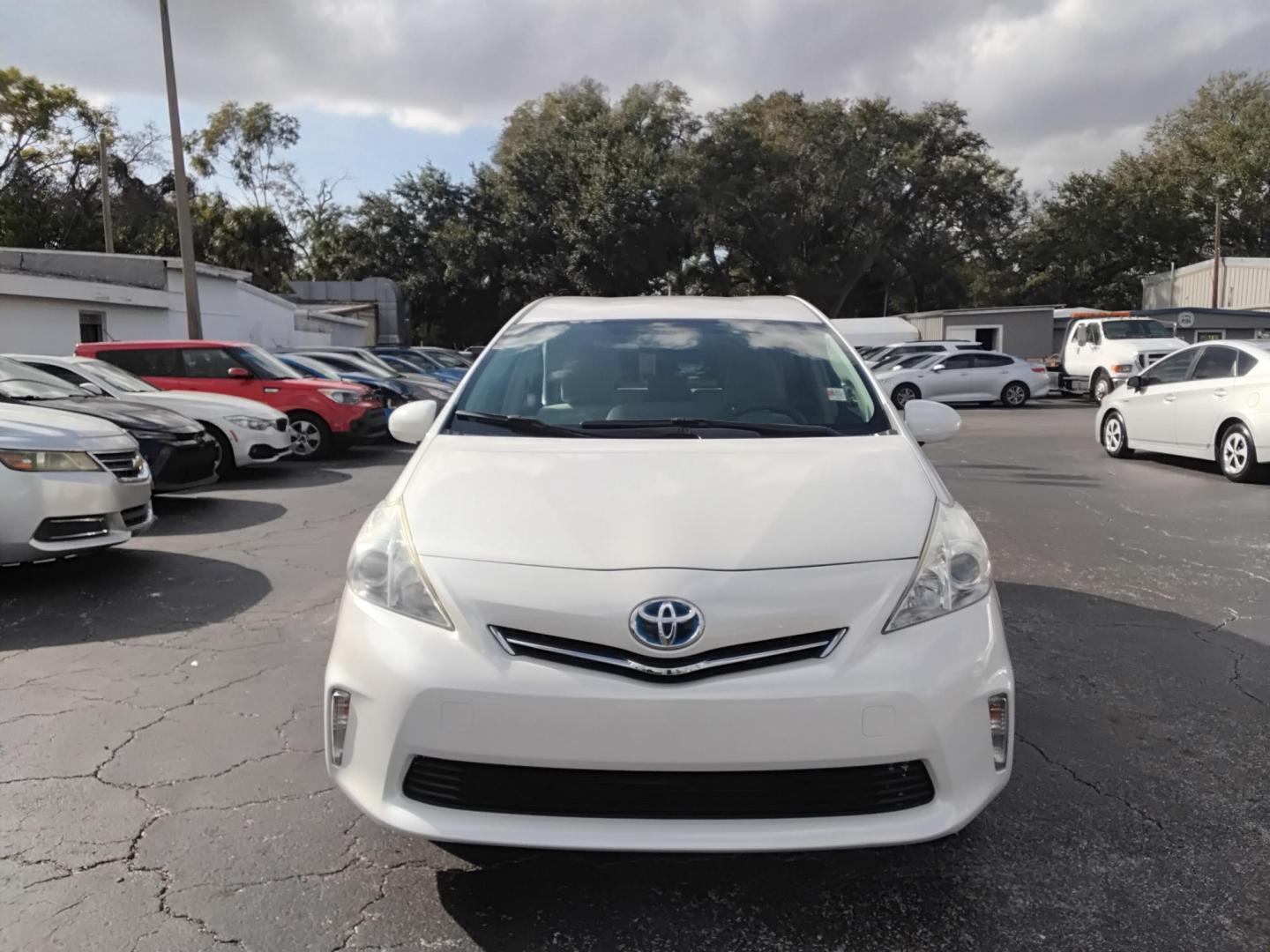 2014 White /White Toyota Prius V Three (JTDZN3EU2E3) with an 1.8L L4 DOHC 16V HYBRID engine, Continuously Variable Transmission transmission, located at 6112 N Florida Avenue, Tampa, FL, 33604, (888) 521-5131, 27.954929, -82.459534 - $499 down plus tax & tag. - Photo#1