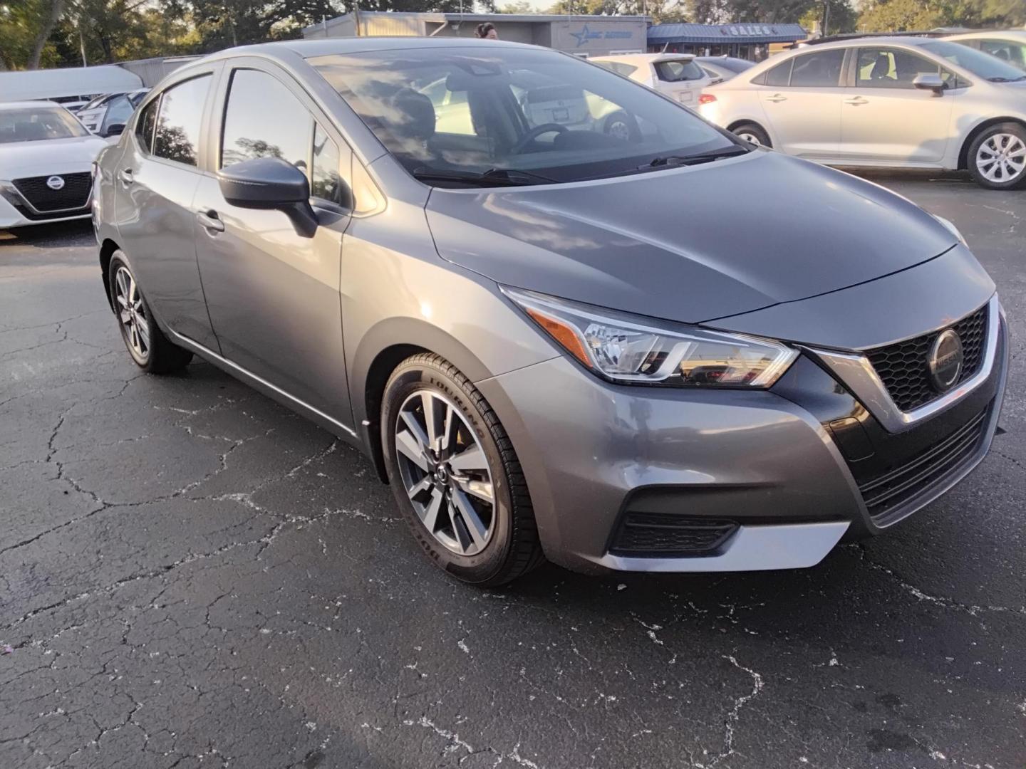 2020 GRAY /Grey Nissan Versa SV (3N1CN8EV8LL) with an 1.6L L4 DOHC 16V engine, CVT transmission, located at 6112 N Florida Avenue, Tampa, FL, 33604, (888) 521-5131, 27.954929, -82.459534 - $499 down plus tax & tag. - Photo#2