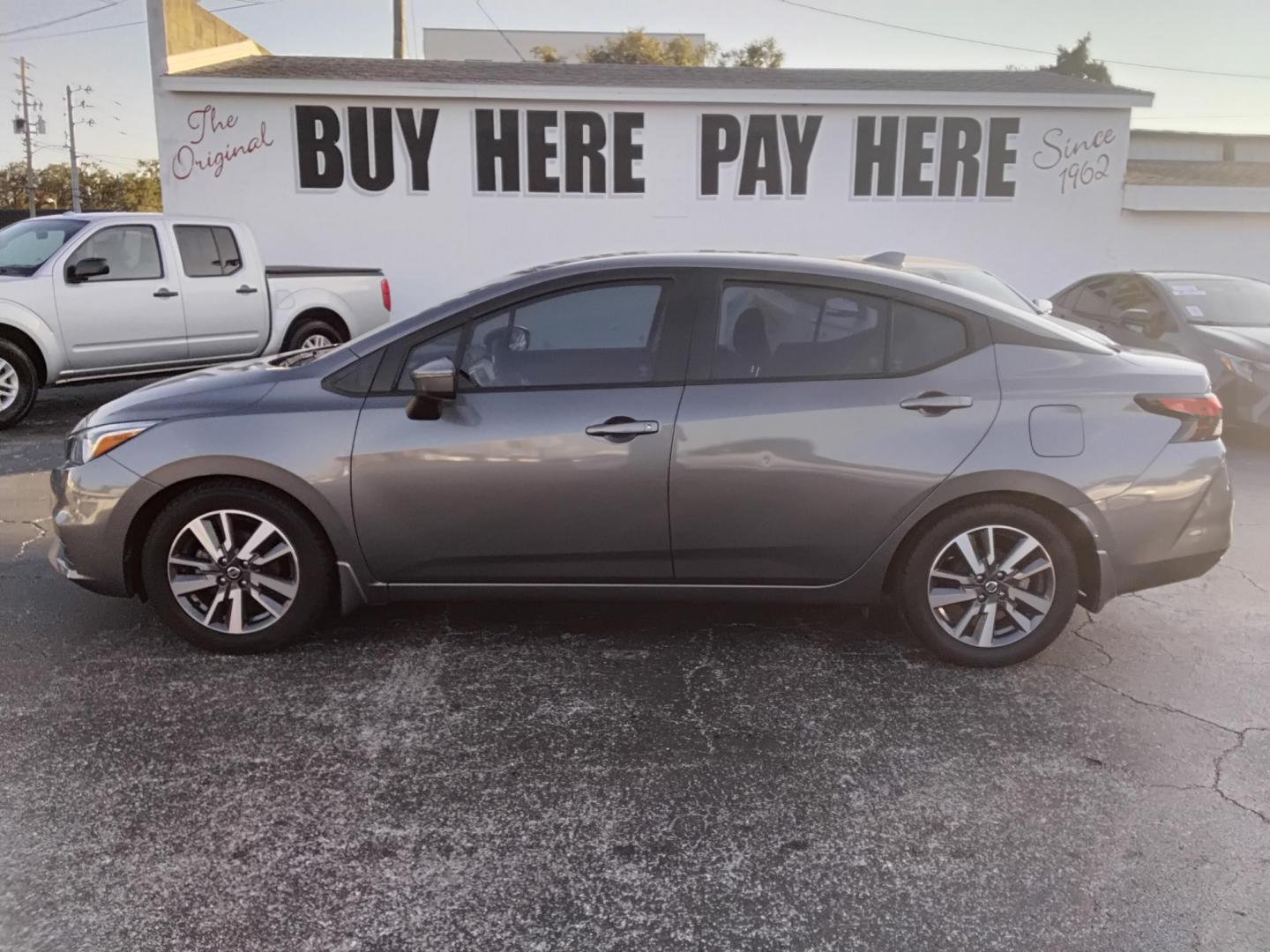 2020 GRAY /Grey Nissan Versa SV (3N1CN8EV8LL) with an 1.6L L4 DOHC 16V engine, CVT transmission, located at 6112 N Florida Avenue, Tampa, FL, 33604, (888) 521-5131, 27.954929, -82.459534 - $499 down plus tax & tag. - Photo#0