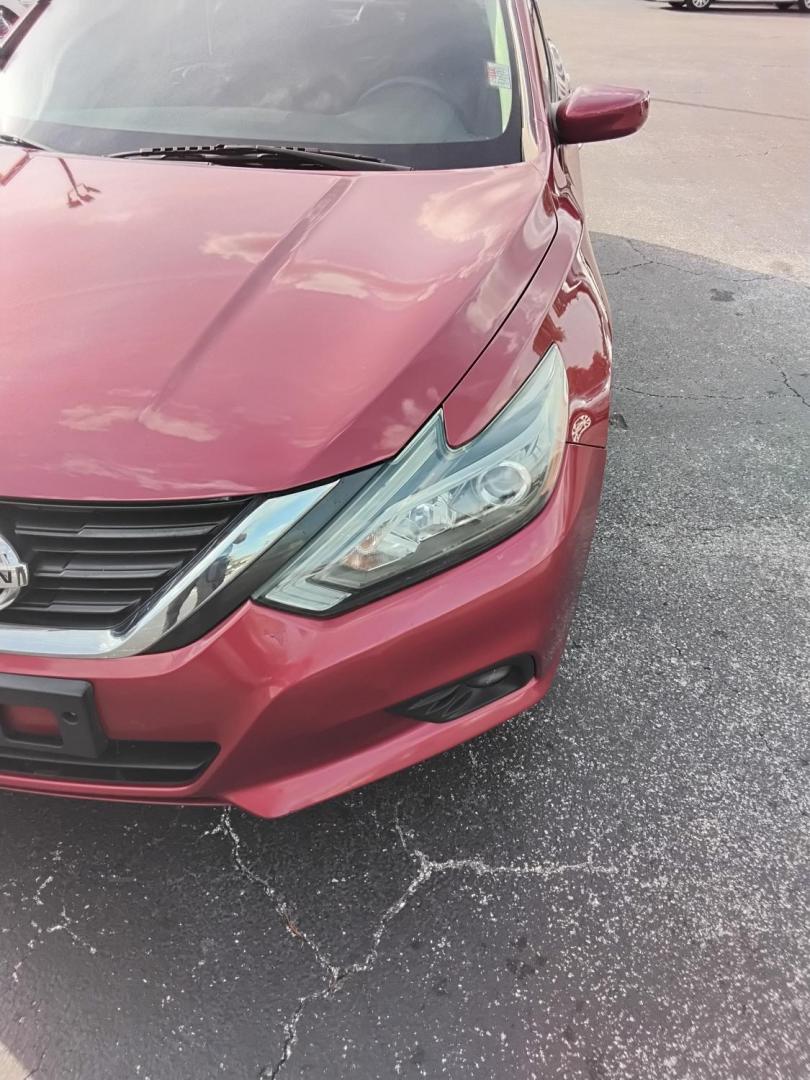 2016 RED /Grey Nissan Altima 2.5 SL (1N4AL3AP3GN) with an 2.5L L4 DOHC 16V engine, CVT transmission, located at 6112 N Florida Avenue, Tampa, FL, 33604, (888) 521-5131, 27.954929, -82.459534 - $499 down plus tax & tag. - Photo#6