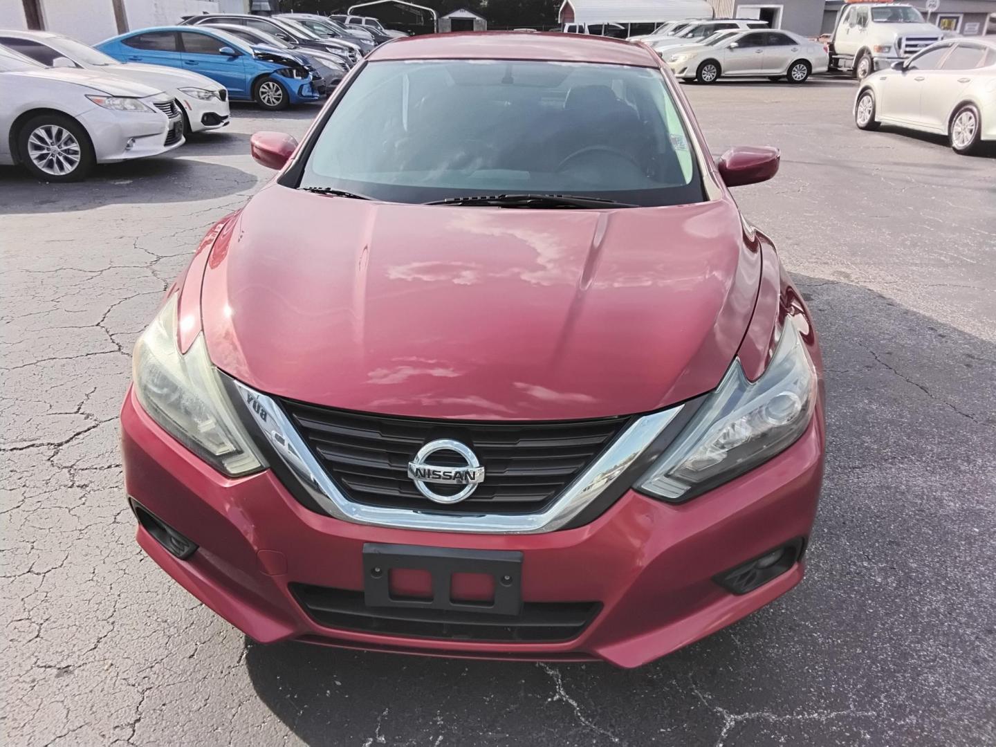 2016 RED /Grey Nissan Altima 2.5 SL (1N4AL3AP3GN) with an 2.5L L4 DOHC 16V engine, CVT transmission, located at 6112 N Florida Avenue, Tampa, FL, 33604, (888) 521-5131, 27.954929, -82.459534 - $499 down plus tax & tag. - Photo#3