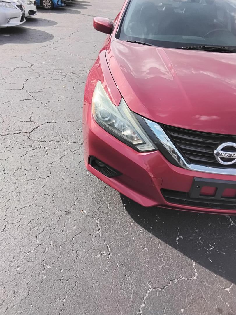 2016 RED /Grey Nissan Altima 2.5 SL (1N4AL3AP3GN) with an 2.5L L4 DOHC 16V engine, CVT transmission, located at 6112 N Florida Avenue, Tampa, FL, 33604, (888) 521-5131, 27.954929, -82.459534 - $499 down plus tax & tag. - Photo#5