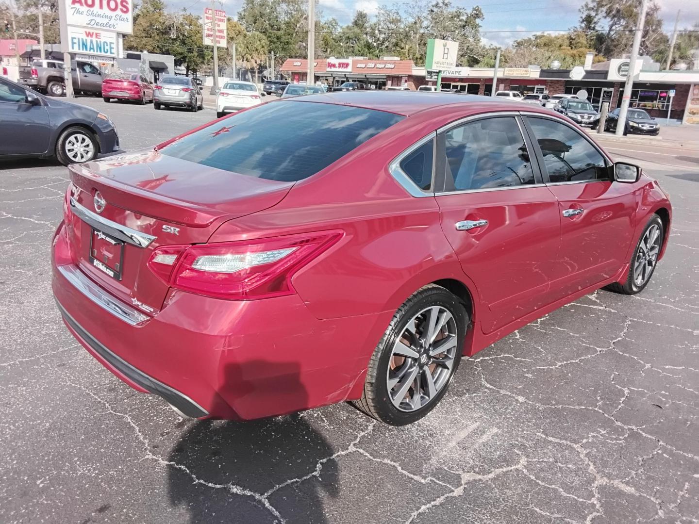 2016 RED /Grey Nissan Altima 2.5 SL (1N4AL3AP3GN) with an 2.5L L4 DOHC 16V engine, CVT transmission, located at 6112 N Florida Avenue, Tampa, FL, 33604, (888) 521-5131, 27.954929, -82.459534 - $499 down plus tax & tag. - Photo#8