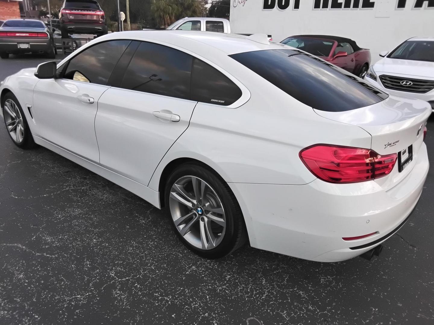 2017 White /Red BMW 4-Series Gran Coupe 430i (WBA4F7C58HG) with an 2.0L L4 DOHC 16V engine, 8A transmission, located at 6112 N Florida Avenue, Tampa, FL, 33604, (888) 521-5131, 27.954929, -82.459534 - $499 down plus tax & tag. - Photo#8