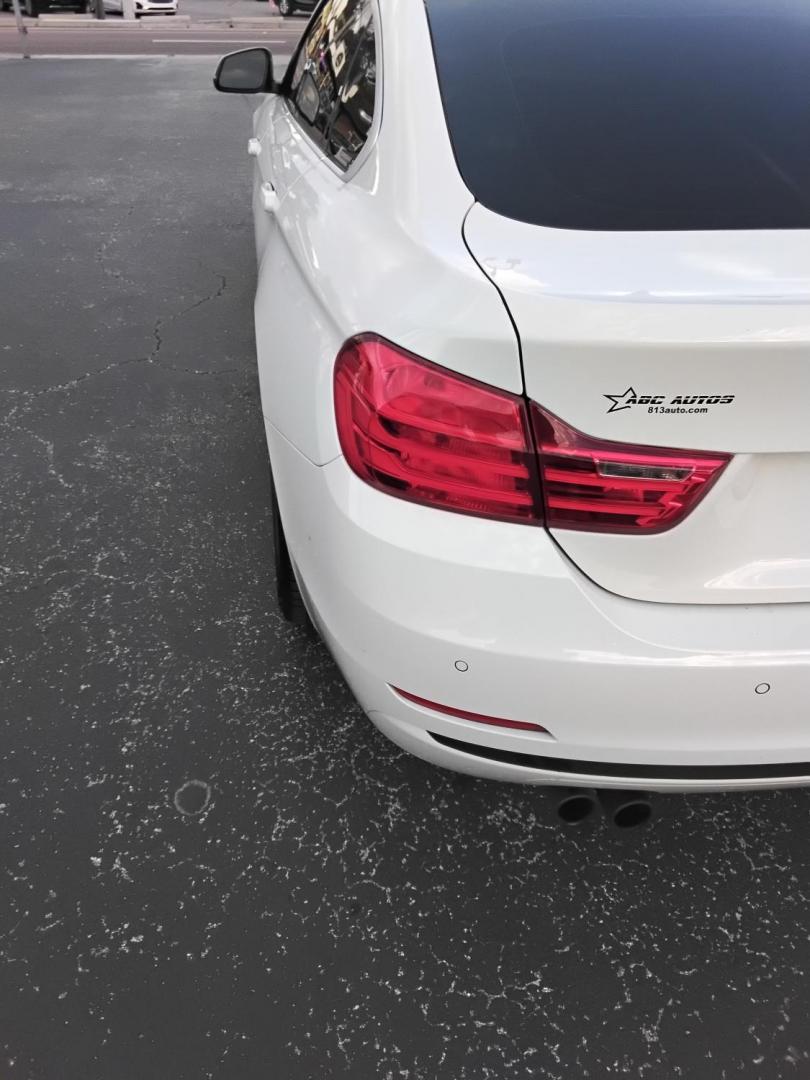 2017 White /Red BMW 4-Series Gran Coupe 430i (WBA4F7C58HG) with an 2.0L L4 DOHC 16V engine, 8A transmission, located at 6112 N Florida Avenue, Tampa, FL, 33604, (888) 521-5131, 27.954929, -82.459534 - $499 down plus tax & tag. - Photo#10