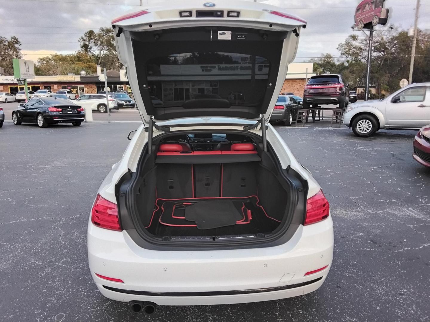 2017 White /Red BMW 4-Series Gran Coupe 430i (WBA4F7C58HG) with an 2.0L L4 DOHC 16V engine, 8A transmission, located at 6112 N Florida Avenue, Tampa, FL, 33604, (888) 521-5131, 27.954929, -82.459534 - $499 down plus tax & tag. - Photo#12