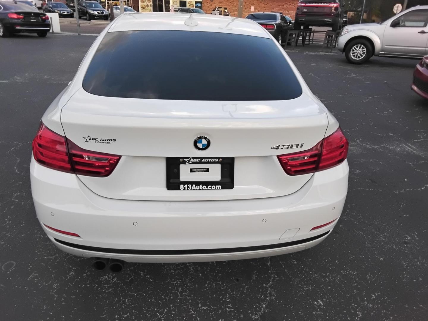 2017 White /Red BMW 4-Series Gran Coupe 430i (WBA4F7C58HG) with an 2.0L L4 DOHC 16V engine, 8A transmission, located at 6112 N Florida Avenue, Tampa, FL, 33604, (888) 521-5131, 27.954929, -82.459534 - $499 down plus tax & tag. - Photo#13