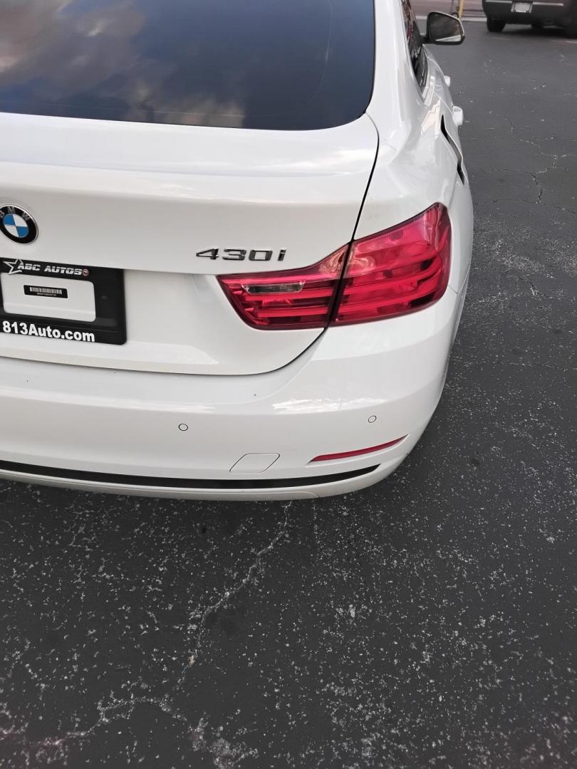 2017 White /Red BMW 4-Series Gran Coupe 430i (WBA4F7C58HG) with an 2.0L L4 DOHC 16V engine, 8A transmission, located at 6112 N Florida Avenue, Tampa, FL, 33604, (888) 521-5131, 27.954929, -82.459534 - $499 down plus tax & tag. - Photo#11