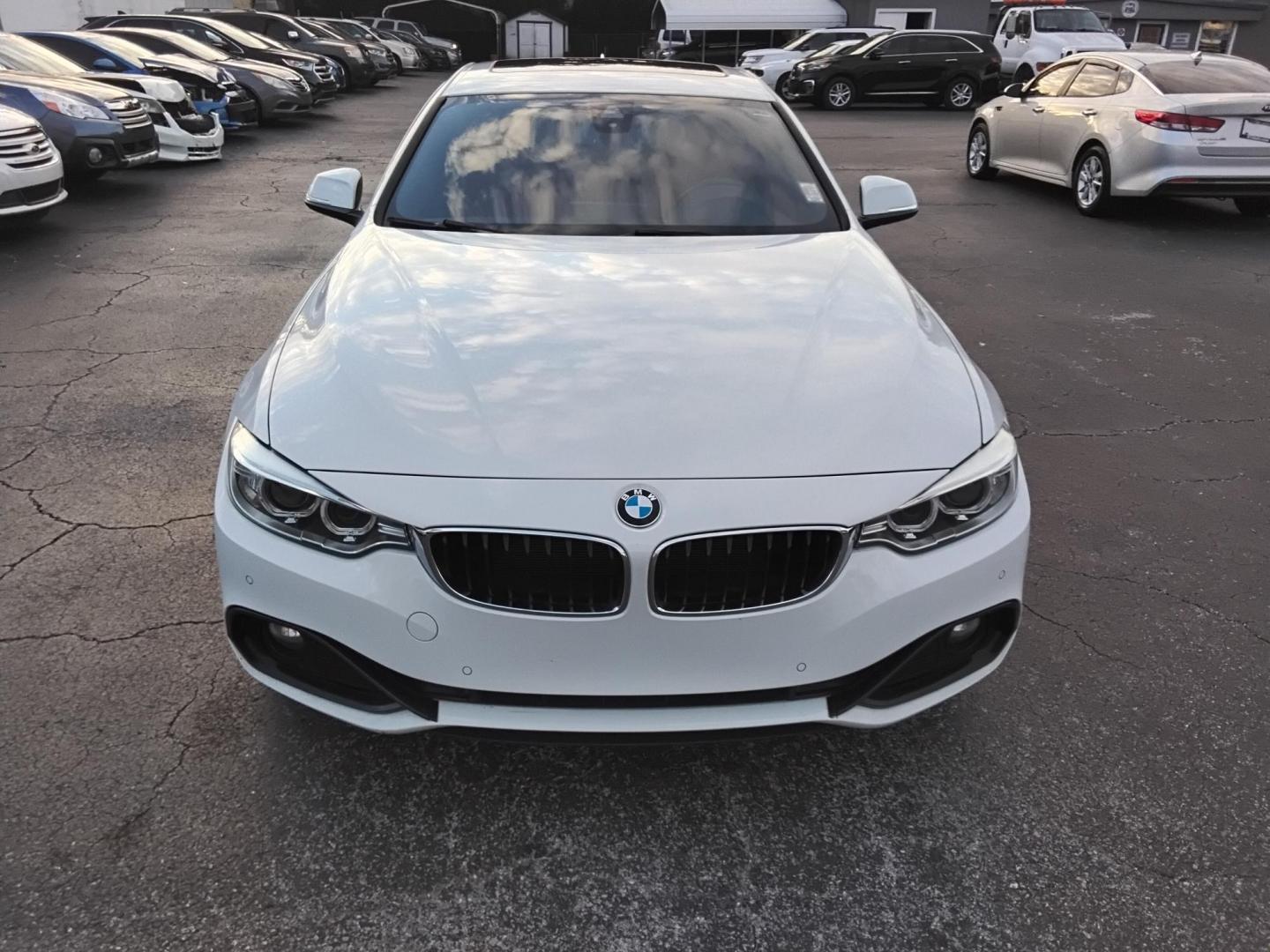 2017 White /Red BMW 4-Series Gran Coupe 430i (WBA4F7C58HG) with an 2.0L L4 DOHC 16V engine, 8A transmission, located at 6112 N Florida Avenue, Tampa, FL, 33604, (888) 521-5131, 27.954929, -82.459534 - $499 down plus tax & tag. - Photo#2