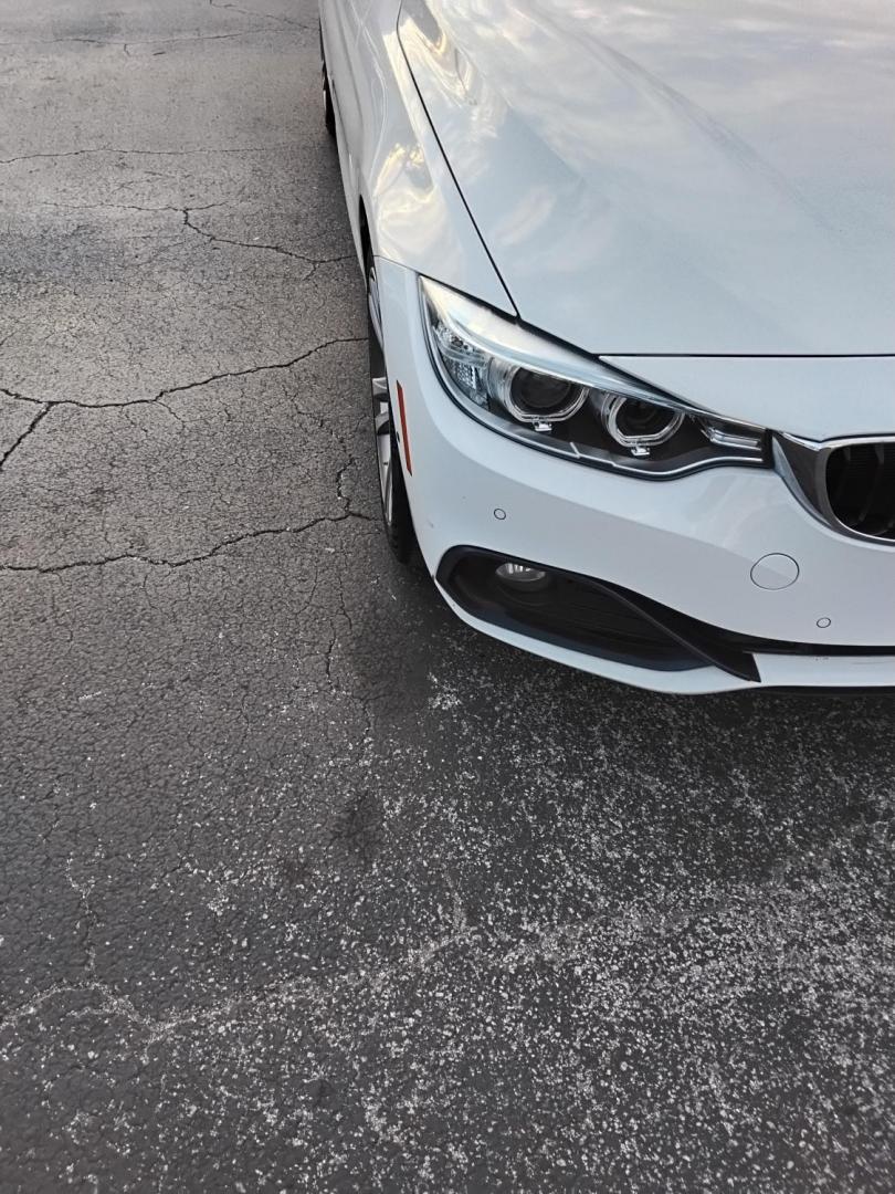 2017 White /Red BMW 4-Series Gran Coupe 430i (WBA4F7C58HG) with an 2.0L L4 DOHC 16V engine, 8A transmission, located at 6112 N Florida Avenue, Tampa, FL, 33604, (888) 521-5131, 27.954929, -82.459534 - $499 down plus tax & tag. - Photo#6
