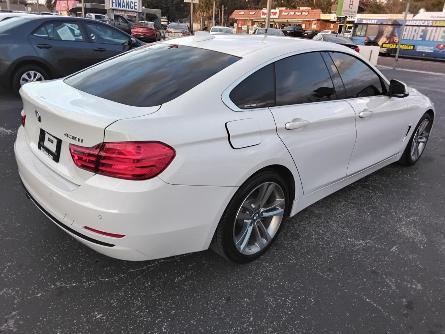 2017 White /Red BMW 4-Series Gran Coupe 430i (WBA4F7C58HG) with an 2.0L L4 DOHC 16V engine, 8A transmission, located at 6112 N Florida Avenue, Tampa, FL, 33604, (888) 521-5131, 27.954929, -82.459534 - $499 down plus tax & tag. - Photo#9