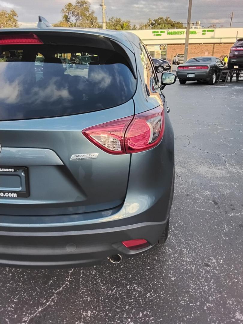 2016 BLUE /Grey Mazda CX-5 Touring (JM3KE2CY4G0) with an 2.5L L4 DOHC 16V engine, 6-Speed Automatic transmission, located at 6112 N Florida Avenue, Tampa, FL, 33604, (888) 521-5131, 27.954929, -82.459534 - $499 down plus tax & tag. - Photo#11
