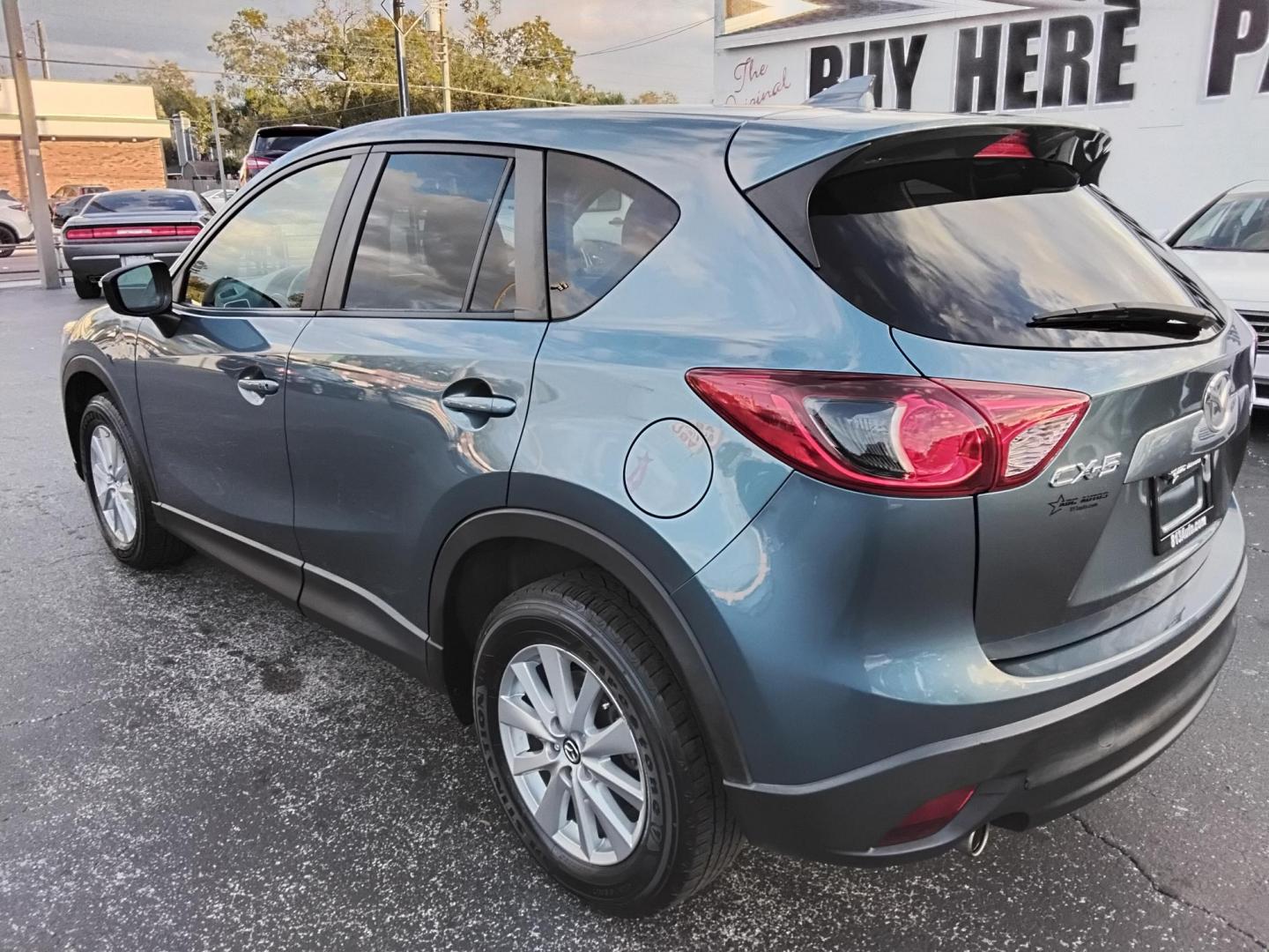 2016 BLUE /Grey Mazda CX-5 Touring (JM3KE2CY4G0) with an 2.5L L4 DOHC 16V engine, 6-Speed Automatic transmission, located at 6112 N Florida Avenue, Tampa, FL, 33604, (888) 521-5131, 27.954929, -82.459534 - $499 down plus tax & tag. - Photo#9