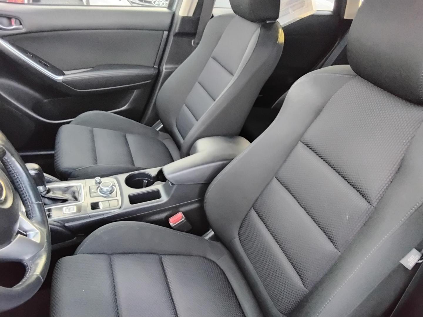 2016 BLUE /Grey Mazda CX-5 Touring (JM3KE2CY4G0) with an 2.5L L4 DOHC 16V engine, 6-Speed Automatic transmission, located at 6112 N Florida Avenue, Tampa, FL, 33604, (888) 521-5131, 27.954929, -82.459534 - $499 down plus tax & tag. - Photo#16