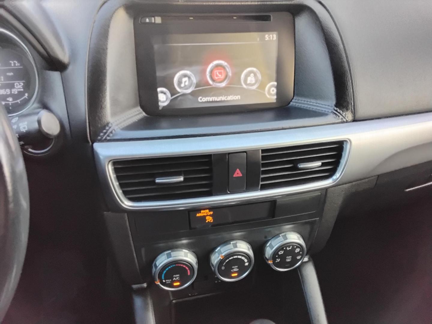 2016 BLUE /Grey Mazda CX-5 Touring (JM3KE2CY4G0) with an 2.5L L4 DOHC 16V engine, 6-Speed Automatic transmission, located at 6112 N Florida Avenue, Tampa, FL, 33604, (888) 521-5131, 27.954929, -82.459534 - $499 down plus tax & tag. - Photo#19